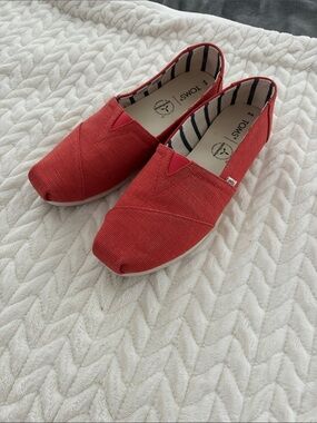 Toms Orange Canvas Slip-On with navy Striped Lining